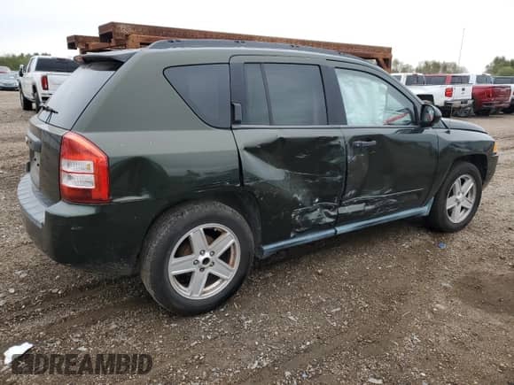 2010 Jeep Compass Sport z VIN 1J4NT1FB6AD626166, wystawiony jako Copart lot #88448045 z przebiegiem 181 098 mil mil oraz Szkoda całkowita • Salvage title. Historia ofert i sprzedaży dostępna na DreamBid. Obrazek 3.