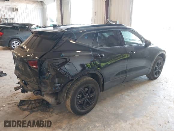 2023 Chevrolet Blazer LT z VIN 3GNKBHR47PS220141, wystawiony jako IAAI lot #43180708 z przebiegiem 29 473 mil mil oraz . Historia ofert i sprzedaży dostępna na DreamBid. Obrazek 4.