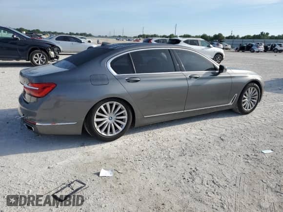 2017 BMW 7 Series 740i xDrive with VIN WBA7E4C31HGV23346, listed as a Copart auction lot 49840905 with 155,047 mi miles and Salvage title. Bid and sale history available at DreamBid. Image 3.