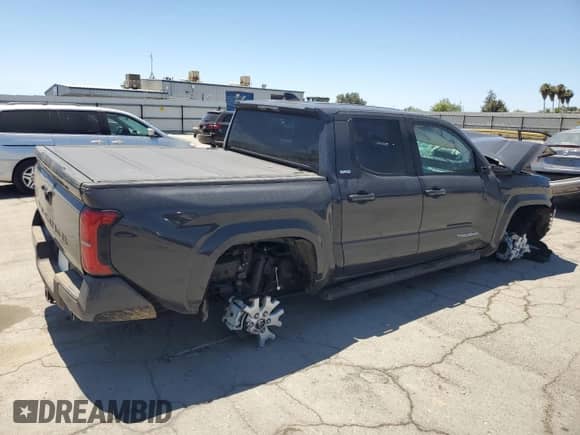 2025 Toyota Tacoma SR5 with VIN 3TMKB5FN1SM038291, listed as a Copart auction lot 64888865 with 3,992 mi miles and Salvage title. Bid and sale history available at DreamBid. Image 3.