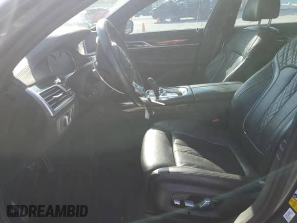 2019 BMW 7 Series 750i with VIN WBA7F0C51KGM25464, listed as a Copart auction lot 62196775 with 105,101 mi miles and Clean title. Bid and sale history available at DreamBid. Image 7.