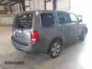 2013 Honda Pilot EX-L with VIN 5FNYF3H51DB027783, listed as a IAAI auction lot 43312919 with 183,629 mi miles and . Bid and sale history available at DreamBid. Image 4.