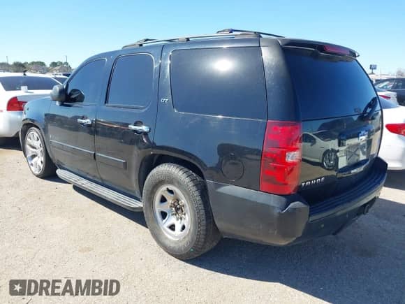 2007 Chevrolet Tahoe LTZ with VIN 1GNFC13J67R245233, listed as a IAAI auction lot 41726159 with 203,841 mi miles and . Bid and sale history available at DreamBid. Image 3.