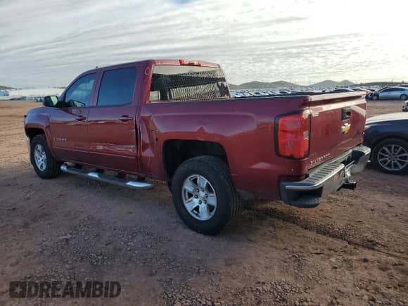 2018 Chevrolet Silverado 1500 LT with VIN 3GCPCREHXJG220462, listed as a Copart auction lot 86527915 with 132,119 mi miles and Salvage title. Bid and sale history available at DreamBid. Image 2.