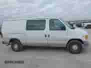 1999 Ford Econoline Cargo with VIN 1FTRE14W0XHB13200, listed as a IAAI auction lot 43476403 with 231,941 mi miles and . Bid and sale history available at DreamBid. Image 14.