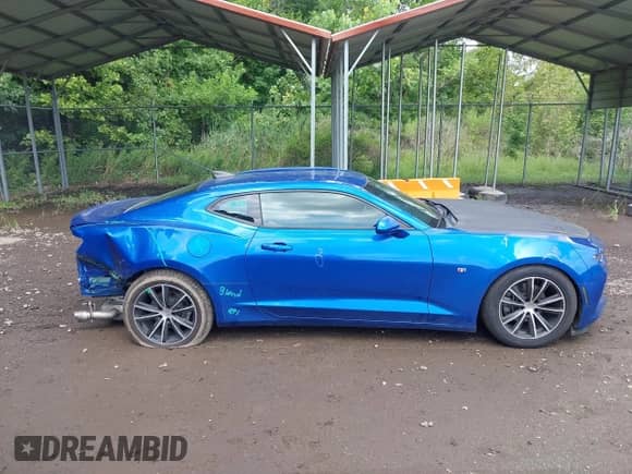 2018 Chevrolet Camaro 1LS z VIN 1G1FA1RX6J0133403, wystawiony jako IAAI lot #42991863 z przebiegiem 63 565 mil mil oraz . Historia ofert i sprzedaży dostępna na DreamBid. Obrazek 13.