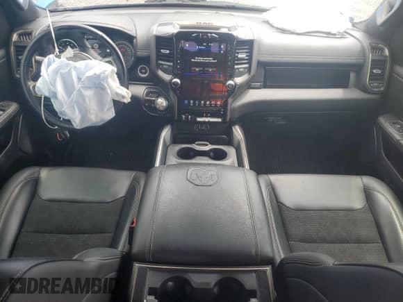 2020 Ram 1500 Rebel z VIN 1C6SRFLT4LN317415, wystawiony jako Copart lot #67455185 z przebiegiem 58 773 mil mil oraz Nie do naprawy • Non repairable. Historia ofert i sprzedaży dostępna na DreamBid. Obrazek 8.