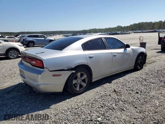 2012 Dodge Charger SE with VIN 2C3CDXBG4CH286718, listed as a Copart auction lot 84606735 with 167,618 mi miles and Salvage title. Bid and sale history available at DreamBid. Image 3.