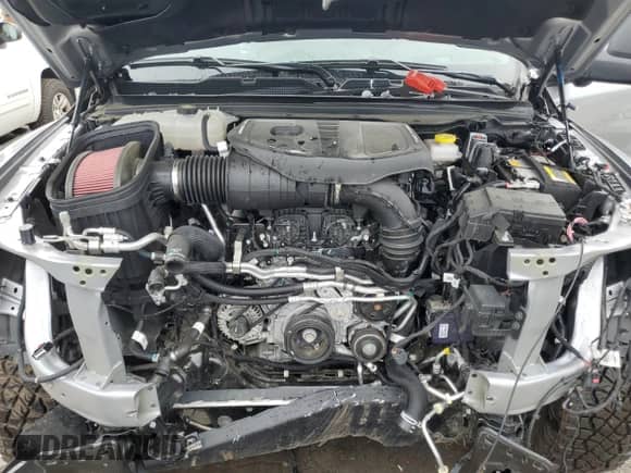 2025 Ram 1500 RHO z VIN 1C6SRFUP2SN573634, wystawiony jako Copart lot #62329235 z przebiegiem 1 406 mil mil oraz Szkoda całkowita • Salvage title. Historia ofert i sprzedaży dostępna na DreamBid. Obrazek 11.