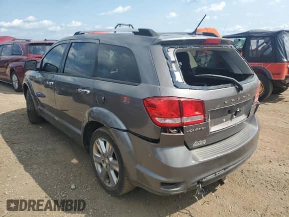 2012 Dodge Journey Crew with VIN 3C4PDCDG1CT204552, listed as a Copart auction lot 66494005 with 145,067 mi miles and Salvage title. Bid and sale history available at DreamBid. Image 2.