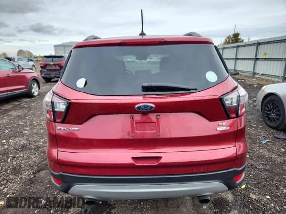 2018 Ford Escape SE с VIN 1FMCU9GD4JUA21888, выставлен на аукционе Copart как лот 82426665 с пробегом 130 471 миль миль и Чистый • Clean title. История ставок и продаж доступна на DreamBid. Изображение 6.