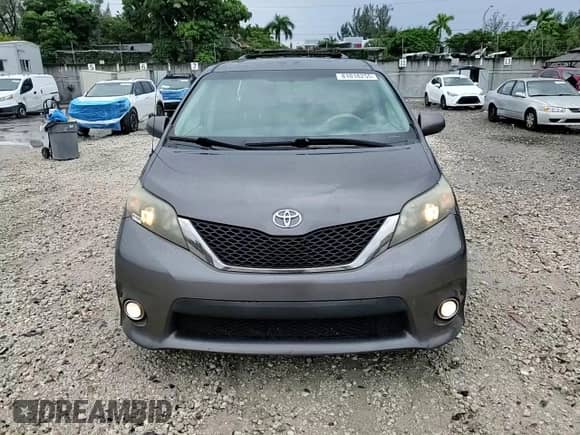 2012 Toyota Sienna SE with VIN 5TDXK3DC7CS249170, listed as a Copart auction lot 81018255 with 152,596 mi miles and Salvage title. Bid and sale history available at DreamBid. Image 14.