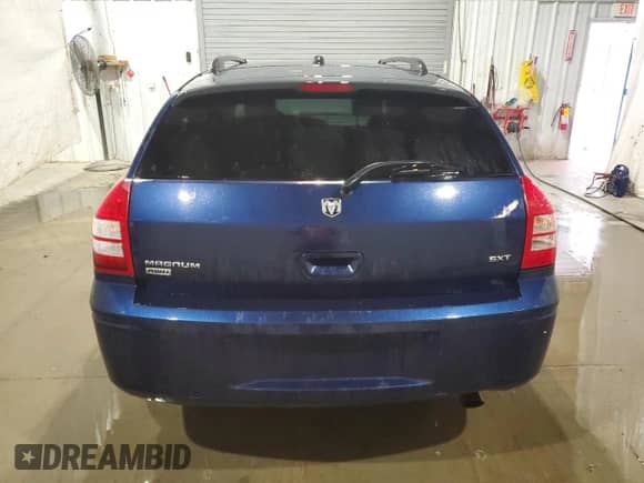 2005 Dodge Magnum SXT with VIN 2D4GZ48V95H537435, listed as a Copart auction lot 74198134 with 84,164 mi miles and Salvage title. Bid and sale history available at DreamBid. Image 6.
