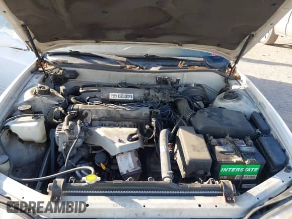 1996 Toyota Camry DX z VIN 4T1BG12K8TU927748, wystawiony jako IAAI lot #43395733 z przebiegiem 175 073 mil mil oraz . Historia ofert i sprzedaży dostępna na DreamBid. Obrazek 10.