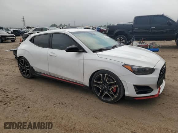 2021 Hyundai Veloster z VIN KMHT36AH9MU011200, wystawiony jako Copart lot #50986355 z przebiegiem 44 477 mil mil oraz Szkoda całkowita • Salvage title. Historia ofert i sprzedaży dostępna na DreamBid. Obrazek 4.