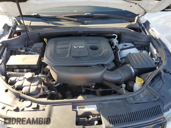 2018 Dodge Durango GT with VIN 1C4RDHDG3JC149827, listed as a Copart auction lot 69884915 with 122,110 mi miles and Salvage title. Bid and sale history available at DreamBid. Image 12.