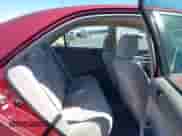 2003 Toyota Camry XLE z VIN 4T1BE30K93U233865, wystawiony jako IAAI lot #42962850 z przebiegiem 142 802 mil mil oraz . Historia ofert i sprzedaży dostępna na DreamBid. Obrazek 8.