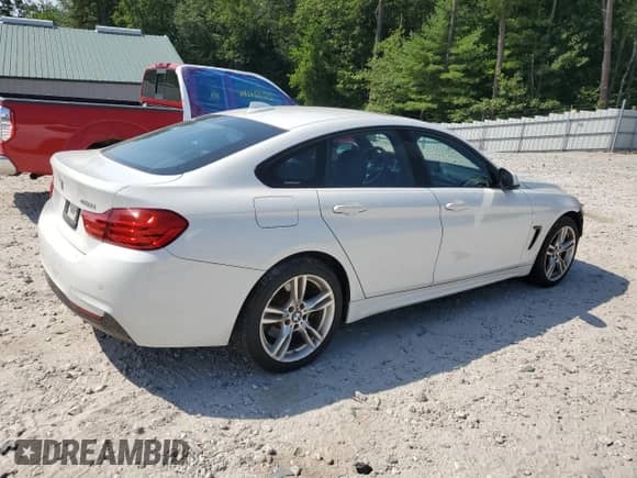 2016 BMW 4 Series 428i xDrive with VIN WBA4C9C51GG135622, listed as a Copart auction lot 68421505 with 143,971 mi miles and Salvage title. Bid and sale history available at DreamBid. Image 3.