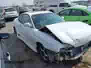 1998 Hyundai Tiburon z VIN KMHJG34F6WU115098, wystawiony jako IAAI lot #41718290 z przebiegiem 133 555 mil mil oraz . Historia ofert i sprzedaży dostępna na DreamBid. Obrazek 1.