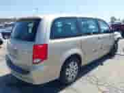 2014 Dodge Grand Caravan SE with VIN 2C4RDGBG2ER316379, listed as a IAAI auction lot 42531072 with 140,095 mi miles and . Bid and sale history available at DreamBid. Image 4.