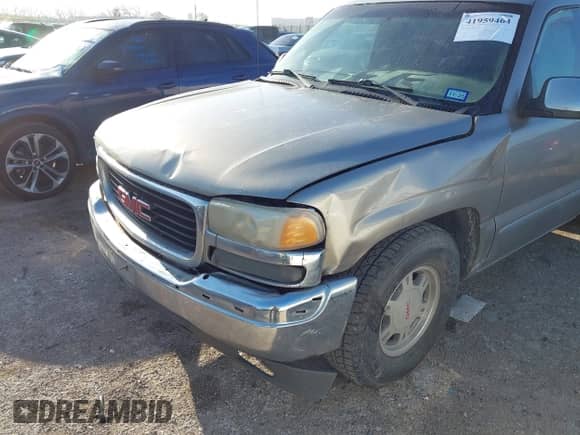 2001 GMC Sierra 1500 SL z VIN 1GTEC14V81Z333066, wystawiony jako IAAI lot #41959464 z przebiegiem 417 637 mil mil oraz . Historia ofert i sprzedaży dostępna na DreamBid. Obrazek 6.