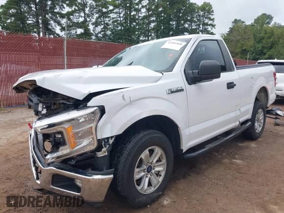 2020 Ford F-150 XL with VIN 1FTMF1CB9LKE94189, listed as a IAAI auction lot 43281808 with 67,611 mi miles and . Bid and sale history available at DreamBid. Image 2.