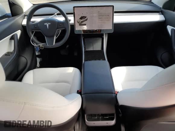 2020 Tesla Model Y Long Range с VIN 5YJYGDEE6LF023427, выставлен на аукционе Copart как лот 81877945 с пробегом 52 307 миль миль и Списание • Salvage title. История ставок и продаж доступна на DreamBid. Изображение 8.