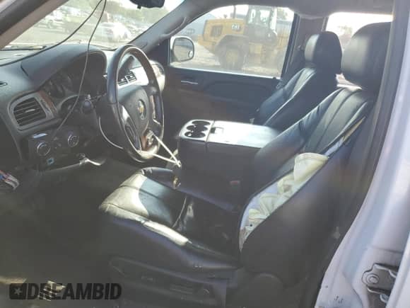 2011 Chevrolet Tahoe LS с VIN 1GNSKAE08BR204021, выставлен на аукционе Copart как лот 65630435 с пробегом 99 355 миль миль и Списание • Salvage title. История ставок и продаж доступна на DreamBid. Изображение 7.