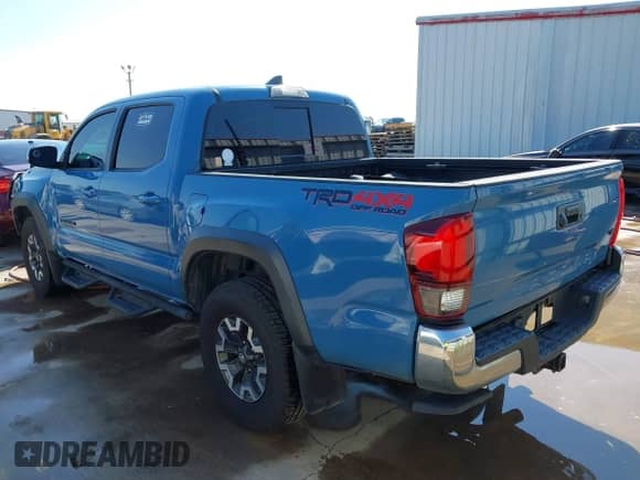 2019 Toyota Tacoma SR z VIN 3TMCZ5AN1KM249062, wystawiony jako IAAI lot #43236818 z przebiegiem 60 599 mil mil oraz . Historia ofert i sprzedaży dostępna na DreamBid. Obrazek 3.