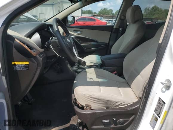 2015 Hyundai Santa Fe with VIN 5XYZU3LB9FG236076, listed as a Copart auction lot 67263405 with 219,677 mi miles and Salvage title. Bid and sale history available at DreamBid. Image 7.