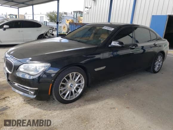 2014 BMW 7 Series ALPINA B7 with VIN WBAYE8C5XED136160, listed as a Copart auction lot 80190935 with 122,086 mi miles and Salvage title. Bid and sale history available at DreamBid. Image 1.