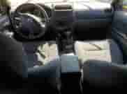 2004 Nissan Frontier XE with VIN 1N6ED29Y34C445431, listed as a Copart auction lot 66913525 with 155,387 mi miles and Salvage title. Bid and sale history available at DreamBid. Image 8.