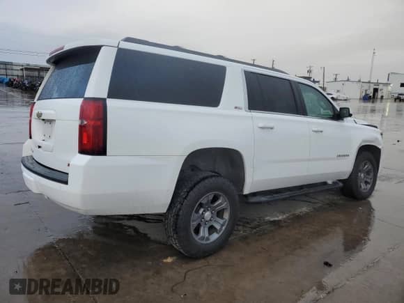 2016 Chevrolet Suburban LT с VIN 1GNSKHKC3GR424228, выставлен на аукционе Copart как лот 83877184 с пробегом 98 596 миль миль и Списание • Salvage title. История ставок и продаж доступна на DreamBid. Изображение 3.