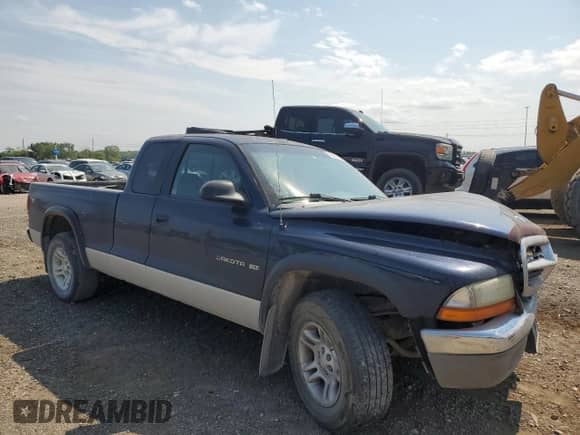 2001 Dodge Dakota с VIN 1B7GL22X11S228638, выставлен на аукционе Copart как лот 66483914 с пробегом 161 953 миль миль и Списание • Salvage title. История ставок и продаж доступна на DreamBid. Изображение 4.