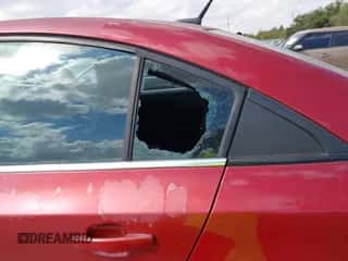 2013 Chevrolet Cruze 2LT z VIN 1G1PE5SB0D7134668, wystawiony jako IAAI lot #43476399 z przebiegiem 159 045 mil mil oraz . Historia ofert i sprzedaży dostępna na DreamBid. Obrazek 6.