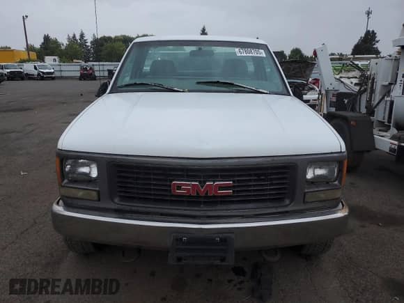 1997 GMC Sierra 1500 z VIN 1GTEK14W6VZ549578, wystawiony jako Copart lot #67808705 z przebiegiem 203 467 mil mil oraz Czysty tytuł • Clean title. Historia ofert i sprzedaży dostępna na DreamBid. Obrazek 5.