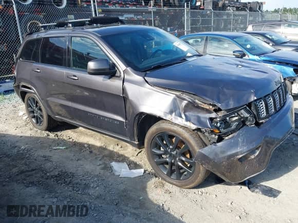 2020 Jeep Grand Cherokee Laredo E with VIN 1C4RJEAG6LC392238, listed as a IAAI auction lot 43104855 with 85,000 mi miles and . Bid and sale history available at DreamBid. Image 1.