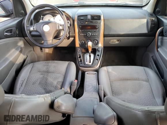 2007 Saturn VUE V6 z VIN 5GZCZ53417S864079, wystawiony jako Copart lot #71417694 z przebiegiem 118 191 mil mil oraz Szkoda całkowita • Salvage title. Historia ofert i sprzedaży dostępna na DreamBid. Obrazek 8.