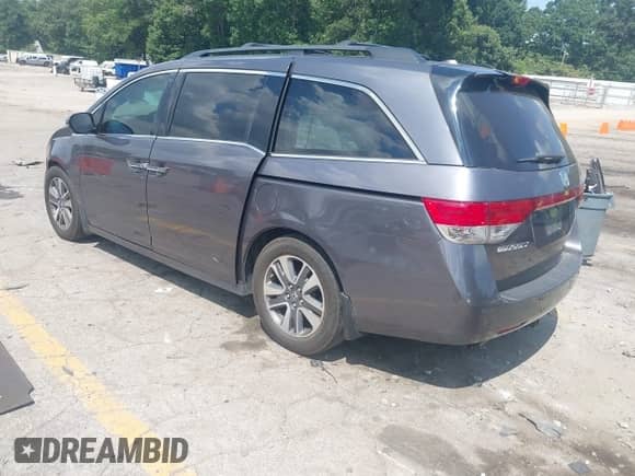 2015 Honda Odyssey Touring Elite с VIN 5FNRL5H98FB099305, выставлен на аукционе IAAI как лот 42880329 с пробегом 203 189 миль миль и . История ставок и продаж доступна на DreamBid. Изображение 3.