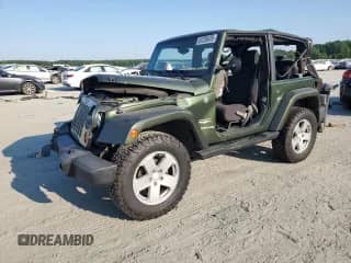 2007 Jeep Wrangler Sahara с VIN 1J8FA54107L153759, выставлен на аукционе Copart как лот 61725475 с пробегом Не указан миль и Списание • Salvage title. История ставок и продаж доступна на DreamBid. Изображение 1.