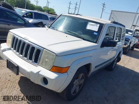 2007 Jeep Commander Sport with VIN 1J8HH48K07C587312, listed as a IAAI auction lot 42004278 with 208,390 mi miles and . Bid and sale history available at DreamBid. Image 2.