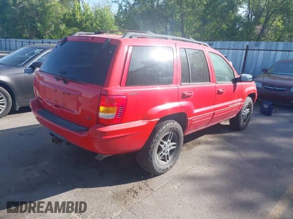 2000 Jeep Grand Cherokee Limited z VIN 1J4GW58N5YC186410, wystawiony jako IAAI lot #42504152 z przebiegiem 140 982 mil mil oraz . Historia ofert i sprzedaży dostępna na DreamBid. Obrazek 4.
