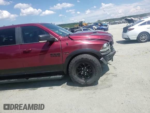 2018 Ram 1500 Rebel z VIN 1C6RR7YT5JS235429, wystawiony jako Copart lot #63518705 z przebiegiem 93 254 mil mil oraz Szkoda całkowita • Salvage title. Historia ofert i sprzedaży dostępna na DreamBid. Obrazek 13.