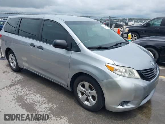2015 Toyota Sienna L with VIN 5TDZK3DC6FS673338, listed as a IAAI auction lot 42497655 with 158,216 mi miles and . Bid and sale history available at DreamBid. Image 1.