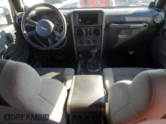 2007 Jeep Wrangler Unlimited X с VIN 1J8GA39167L155372, выставлен на аукционе Copart как лот 84806345 с пробегом 244 289 миль миль и Списание • Salvage title. История ставок и продаж доступна на DreamBid. Изображение 8.