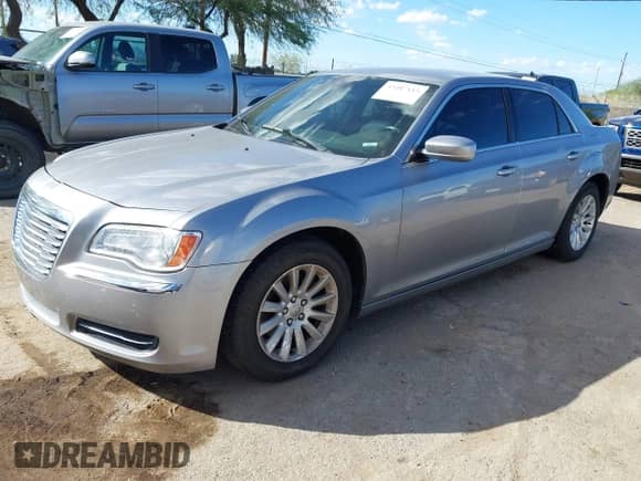 2014 Chrysler 300 with VIN 2C3CCAAG2EH382657, listed as a IAAI auction lot 43487115 with 212,933 mi miles and . Bid and sale history available at DreamBid. Image 2.