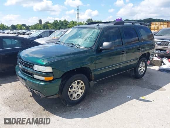 2004 Chevrolet Tahoe Z71 with VIN 1GNEK13ZX4R209898, listed as a IAAI auction lot 42980651 with 196,173 mi miles and . Bid and sale history available at DreamBid. Image 2.
