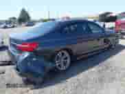 2016 BMW 7 Series 750i xDrive with VIN WBA7F2C51GG416895, listed as a IAAI auction lot 42142979 with Not provided miles and . Bid and sale history available at DreamBid. Image 4.