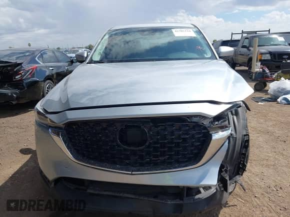 2023 Mazda CX-5 S Carbon Edition z VIN JM3KFBCM0P0137474, wystawiony jako IAAI lot #42785110 z przebiegiem 39 335 mil mil oraz . Historia ofert i sprzedaży dostępna na DreamBid. Obrazek 12.