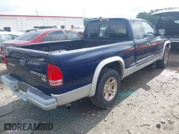 2004 Dodge Dakota SLT with VIN 1D7GL42K84S548808, listed as a IAAI auction lot 42387628 with 244,744 mi miles and . Bid and sale history available at DreamBid. Image 4.